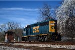 Evidence of an early spring is evident as L20505 heads west on track 1 past long-unused ND Cabin.